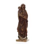 Decorative faux carved standing figure of Madonna and Child, with scythe at her feet in polychrome