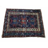 Persian blue ground Tabriz type rug, with triple star medallions to the centre within multiple