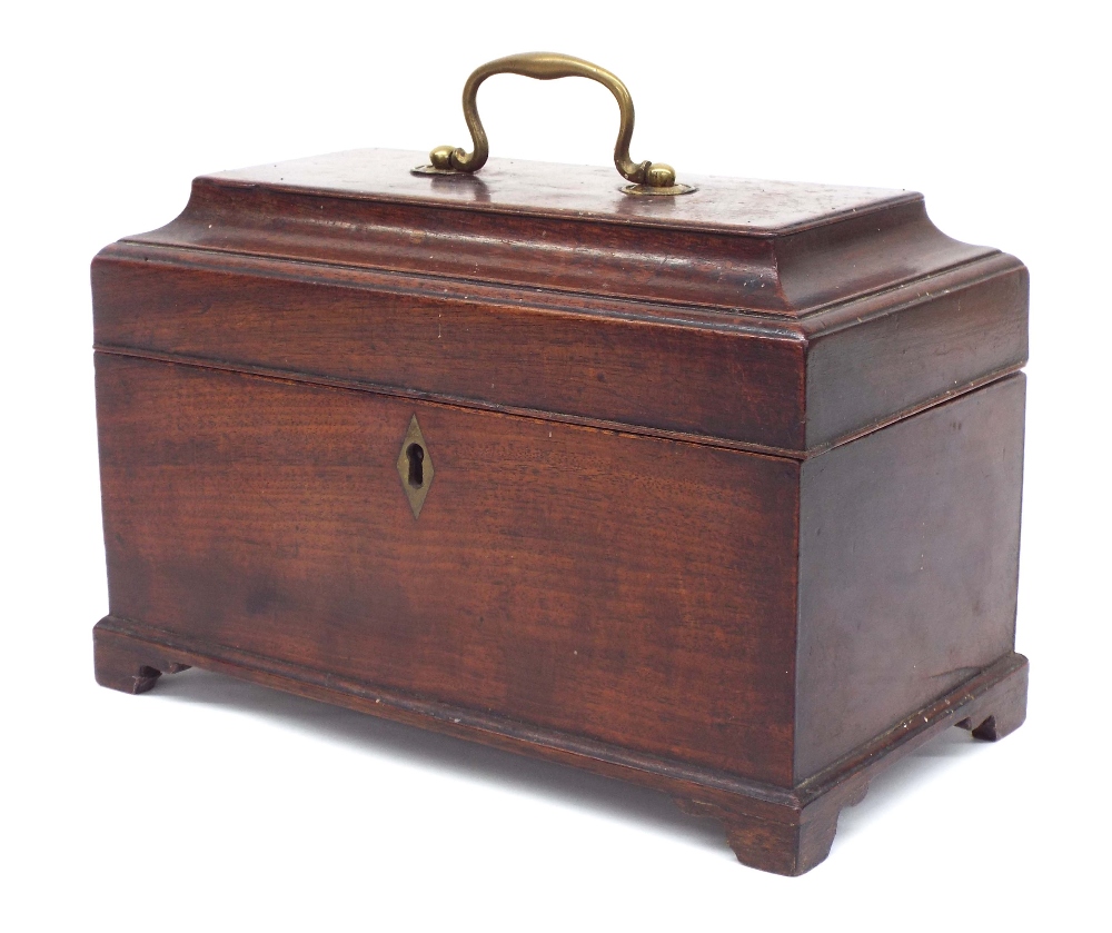 Georgian mahogany sarcophagus tea caddy, the cover with brass swing handle enclosing divided