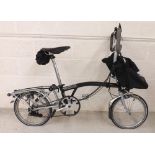 Brompton folding commuter bicycle, black, Brooks studded leather saddle, handle bag