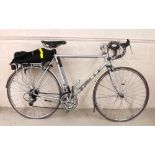Tourist twenty-four speed bicycle, chrome, 22" frame, Brooks studded leather saddle, rear pannier