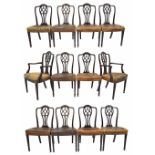 Fine set of twelve Hepplewhite style dining chairs, with low relief carved foliate decoration and