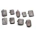 Nine early 20th century silver vesta cases, seven Birmingham and two with Chester marks, 5.5oz t