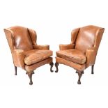 Good pair of tan leather upholstered armchairs, 42" high, seat 20" high, 34" wide