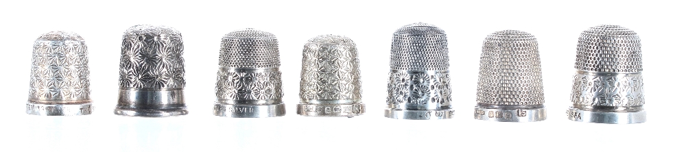 Seven assorted silver thimbles, 23.1gm (7)