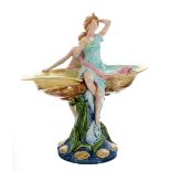 Continental Art Deco porcelain figural centrepiece, in majolica glaze modelled with two ladies