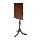 19th century mahogany tilt top side table, the rectangular top on turned support raised on tripod