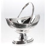 George III silver sugar basket, boat shaped, with pricked and engraved borders and floral swag
