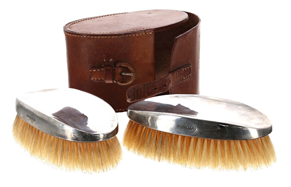 Cased pair of silver mounted hairbrushes by Daniel Manufacturing Company, Birmingham 1945, 5.5"