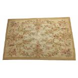 Aubusson type rug, with central panels within foliate swag garlands on a natural ground, 48" x 74"