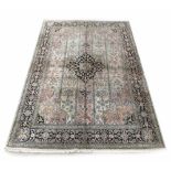 Good Persian silk handmade carpet, the central foliate medallion on a natural ground within multiple