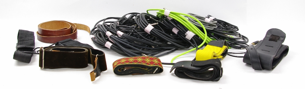 Seventeen various instrument cables including jack and XLR, eight various guitar straps and a