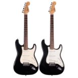 Squier by Fender Affinity series Strat electric guitar, black finish; together with a Squier by