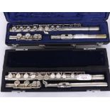 Hernals Japan silver plated flute; also a Buffet 225 silver plated flute with Cooper scale, both