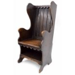 Oak wingback Shepherds chair in the 18th century manner, 22" wide, the back 47" high