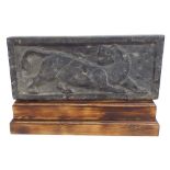 Decorative Bactrian stone of a mythical lion, within a raised border, 14" x 6", mounted upon a