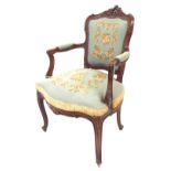 French upholstered fauteuil (armchair), the carved frame with reeded open arms and cabriole legs,