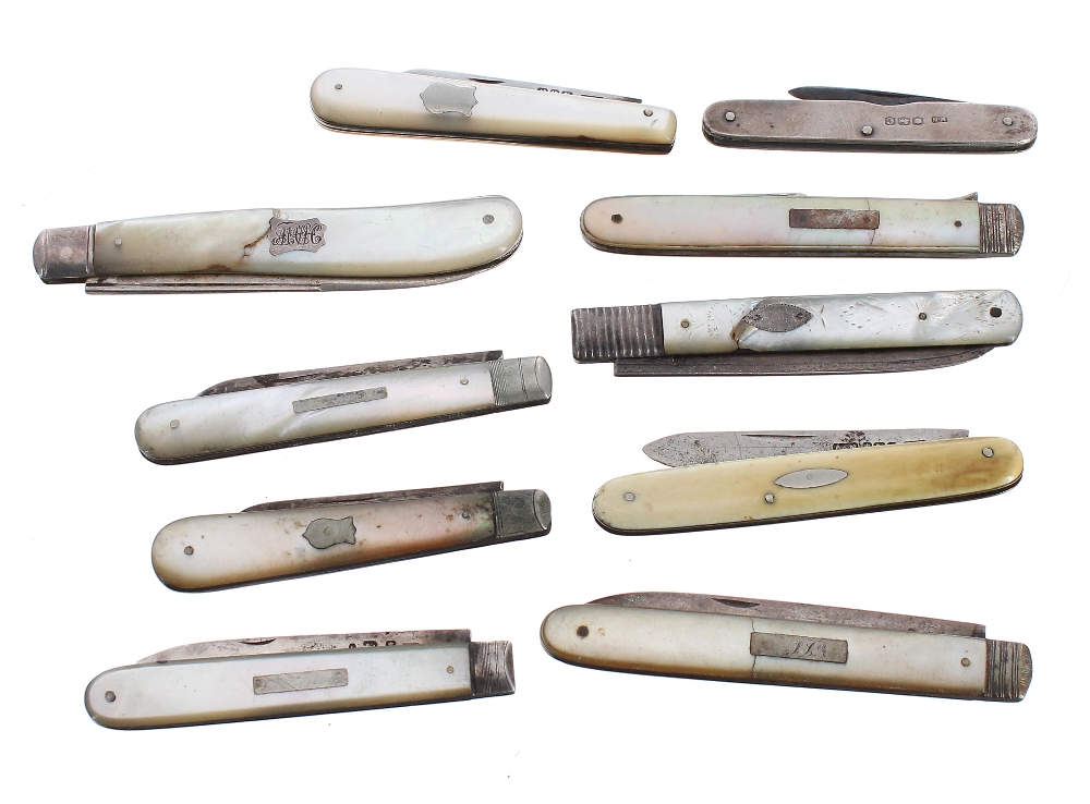 Ten silver blade folding penknives, mostly with mother of pearl handles (10)