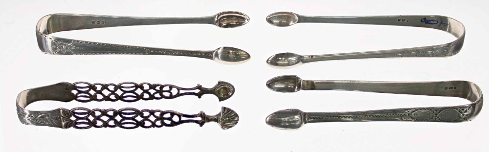 Three pairs of Georgian silver bright-cut sugar nips, together with a further pierced pair of