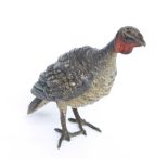 Cold painted bronze figure of a turkey, stamped marks to the underside of the tail, 3.5" high (at