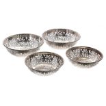 Set of four George V circular pierced silver bowls, maker Walker & Hall, Sheffield 1919, two at 5"