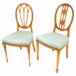 Attractive matched pair of satinwood bedroom chairs in the Sheraton manner, each with oval pierced