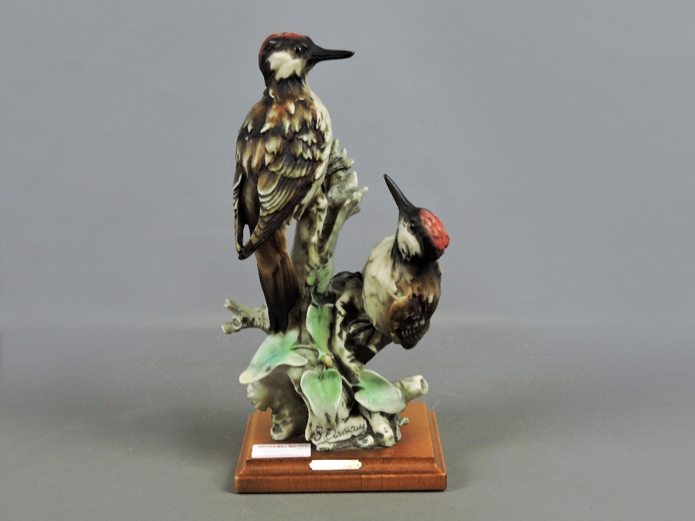 Large G. Armani figure of a pair of woodpeckers, on a wooden base, 11.8" high