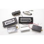 Selection of guitar pickups, to include two Fender telecaster pickups (one faulty), a pair of rail