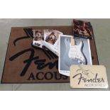 Fender Acoustics floor rug, 34.5" x 47"; together with a Fender Acoustics sign, three small