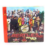 The Beatles - Paul McCartney autographed Sgt Pepper's Lonely Hearts Club Band CD