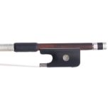 French silver mounted violoncello bow stamped Lamy, the stick round, the ebony frog inlaid with