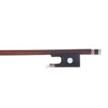 19th century French silver mounted violin bow, the stick round, the ebony frog inlaid with large