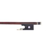 Nickel mounted violin bow circa 1850, the stick round, the ebony frog inlaid with pearl eyes and the