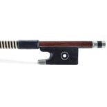 Nickel mounted violin bow, unstamped, the stick octagonal, the ebony frog inlaid with silver rings