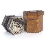 Three row Anglo concertina with thirty-two bone buttons on pierced metal ends, five-fold bellows,