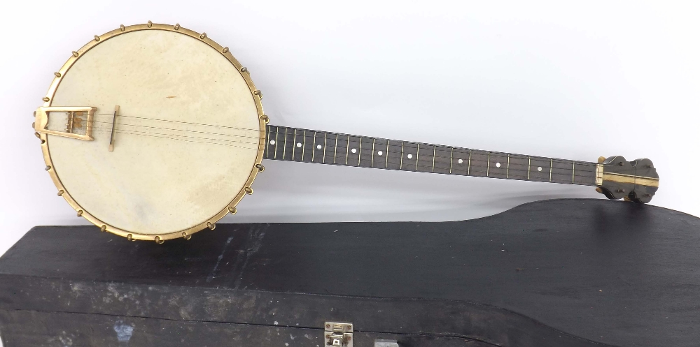 1920s plectrum banjo, with good quality heavy tone ring, twenty-two fret ebony fingerboard, 11"