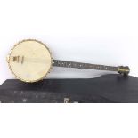 1920s plectrum banjo, with good quality heavy tone ring, twenty-two fret ebony fingerboard, 11"