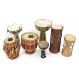Collection of ethnic drums; including Darabukka, Tabla and talking drums (7)