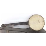 English six string fretless banjo, circa 1880, with thirty tensioners, original friction pegs, 11.5"