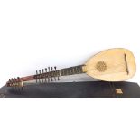 1957 Archlute by and labelled Arnold Dolmetch, with twenty-three strings in twelve courses, multi-