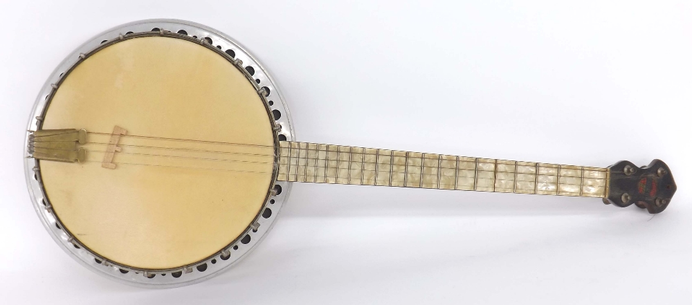 1930s Broadcaster nineteen fret tenor resonator banjo, pearloid finish to the rim and fingerboard,