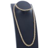 18ct bicolour necklace and bracelet set, the necklace 15.5" long, the bracelet 6" long, 16.9gm (