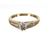 18ct solitaire round brilliant-cut diamond ring with set shoulders, 0.20ct approx, clarity SI1-2,