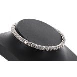 Impressive 14ct white gold round brilliant-cut diamond line bracelet, estimated 9.25ct approx,