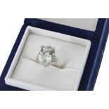 White gold diamond and green amethyst ring, 7.1gm, the amethyst 17mm x 11.5mm, ring size N/O - **