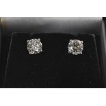 Pair 18ct white gold round brilliant diamond ear studs, estimated 1.41ct, approx, clarity SI, colour