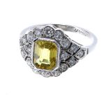 Ornate platinum yellow sapphire and diamond dress ring, the sapphire 1.49ct approx, 13mm, 4.7gm,
