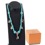 DoDo turquoise coloured stone set 18ct charm necklet, with six charms, 28.3gm, 15" long approx (