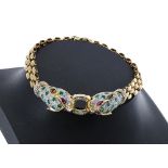 18ct emerald, ruby and diamond set leopard head bracelet, 18.1gm, width 11.5mm, the clasp numbered