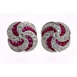 Good pair of 18ct white gold ruby and diamond cluster earrings of swirl design, post backs with